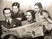 1940's family reading the newspaper