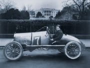 Antique race car in front of the White House