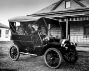 Antique automobile with driver