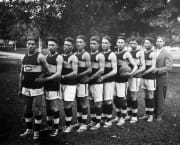 1909 basketball team posing outside